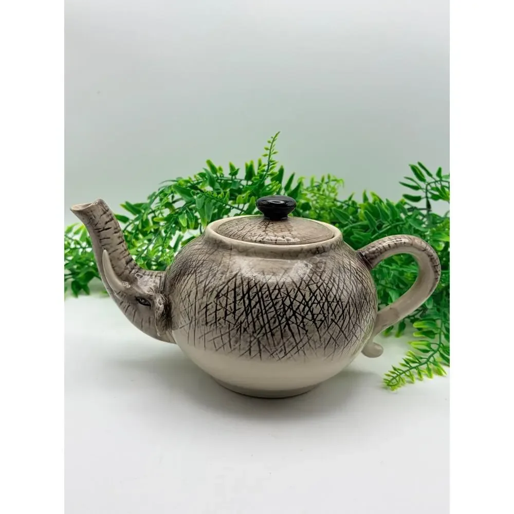 Vintage world market elephant tea pot.